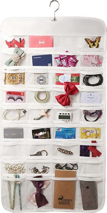 ORGANIZZATORE ORGANIZER DI GIOIELLI DA APPENDERE DOPPIO LATO 72 TASCHE JEWELLERY Casa e cucina/Organizzazione interni/Organizzazione guardaroba/Ripiani pensili Trade Shop italia - Napoli, Commerciovirtuoso.it