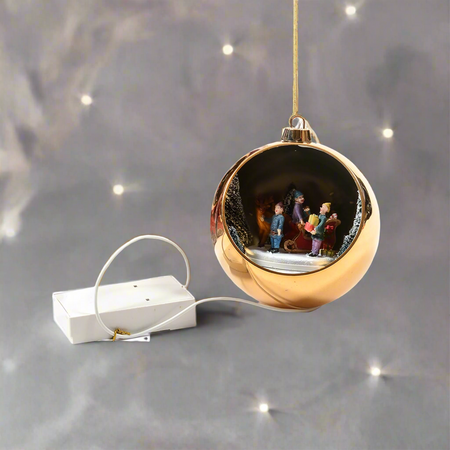 Sfera natalizia con carosello con musica, luci e movimento a batteria