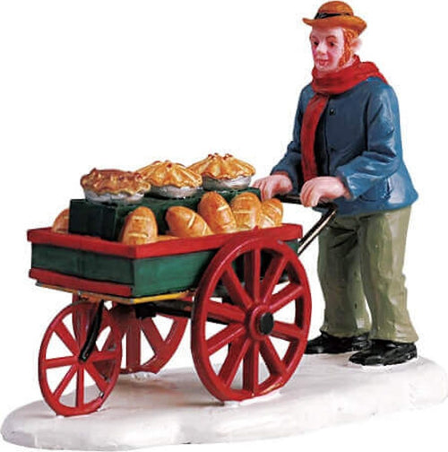 Panettiere con carretto, personaggio per villaggio di Natale in Poliresina Casa e cucina/Decorazioni per interni/Addobbi e decorazioni per ricorrenze/Decorazioni natalizie/Oggettistica MagiediNatale.it - Altamura, Commerciovirtuoso.it