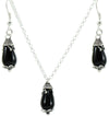 Parure donna collana e orecchini in argento su coccu con pietra onice a goccia