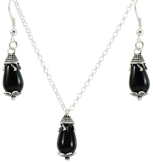 Parure donna collana e orecchini in argento su coccu con pietra onice a goccia