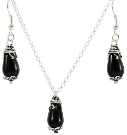 Parure donna collana e orecchini in argento su coccu con pietra onice a goccia