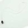 Parure donna collana e orecchini in argento su coccu con pietra onice a goccia
