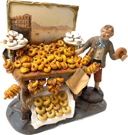 Pastore con ciambelle statuetta in terracotta artigianale per presepe napoletano Casa e cucina/Decorazioni per interni/Addobbi e decorazioni per ricorrenze/Decorazioni natalizie/Presepi/Statuine e fondali per il presepe MagiediNatale.it - Altamura, Commerciovirtuoso.it