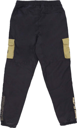 PRIMITIVE-Pantalone-Tuta-Uomo-Global-Tech-Pant-X-Independent-Black-da-uomo