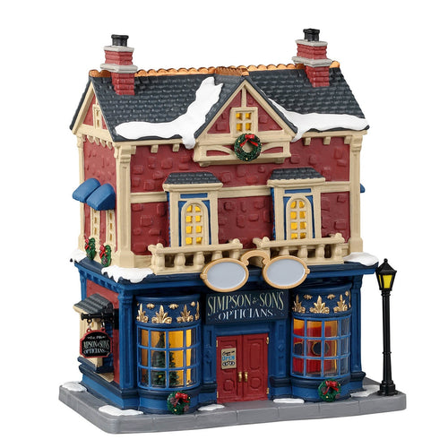 Decorazione Simpson & Sons Opticians per Villaggio di Natale e presepe, in Porcellana da h 13 cm