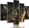 Quadro-Multipannello-Dubai-di-notte,-panorama-della-città