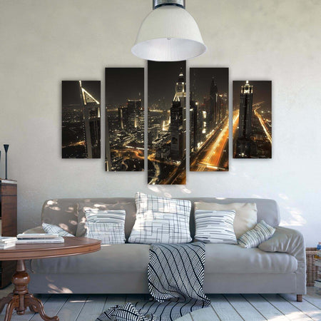 Quadro-Multipannello-Dubai-di-notte,-panorama-della-città