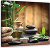 Quadro-su-tela,-Composizione-di-zen-da-pietre-nere-e-bambù