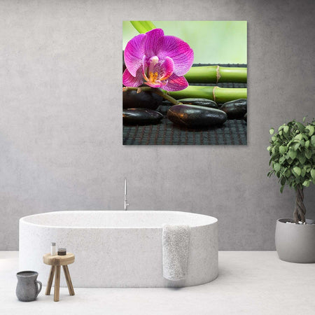 Quadro-su-tela,-Orchidea-su-pietre-nere