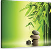 Quadro-su-tela,-Zen-e-pietre-di-bambù-su-uno-sfondo-verde