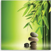 Quadro-su-tela,-Zen-e-pietre-di-bambù-su-uno-sfondo-verde