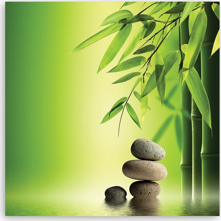 Quadro-su-tela,-Zen-e-pietre-di-bambù-su-uno-sfondo-verde