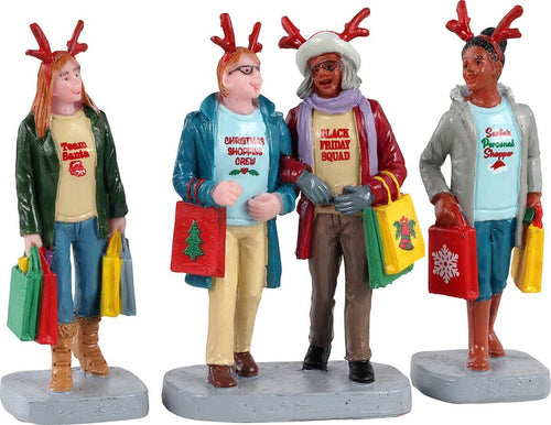 Ragazze cha fanno shopping natalizio statuette in poliresina per villaggio di Natale Casa e cucina/Decorazioni per interni/Addobbi e decorazioni per ricorrenze/Decorazioni natalizie/Oggettistica MagiediNatale.it - Altamura, Commerciovirtuoso.it