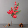 Rametto natalizio con bacche rosse e foglie decorative h 26,5 cm