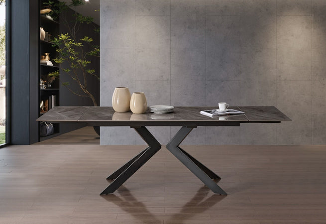 Tavolo "Pollux" con gambe in ferro e piano in pietra sinterizzata 160/240 x 110 x h 75 cm