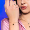 ROBERTO-GIANNOTTI-BRACCIALE-IN-ORO-CON-PUNTO-LUCE-E-PENDENTE-ANGELO