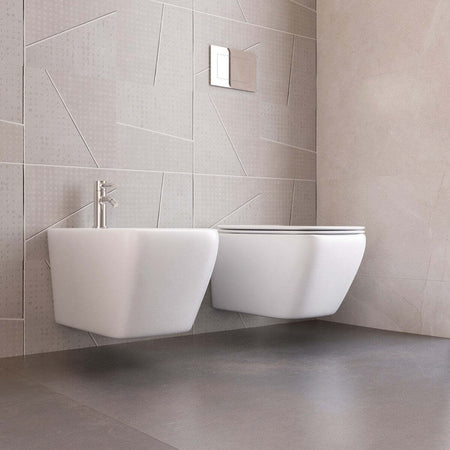 Sanitari-Sospesi-Filo-Muro-in-ceramica-bianca-con-copri-vaso-frizionato-Qubo