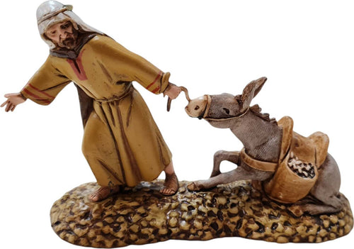 Scena Mercante con Asino seduto in resina personaggio per presepe h 10 cm Casa e cucina/Decorazioni per interni/Addobbi e decorazioni per ricorrenze/Decorazioni natalizie/Presepi/Statuine e fondali per il presepe MagiediNatale.it - Altamura, Commerciovirtuoso.it