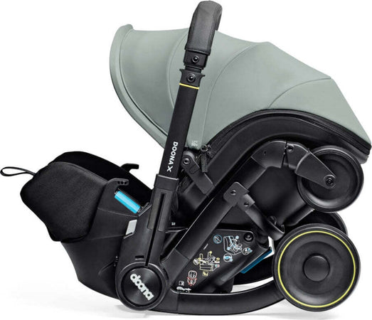 Seggiolino-Auto-e-Passeggino-Doona-X-I-size