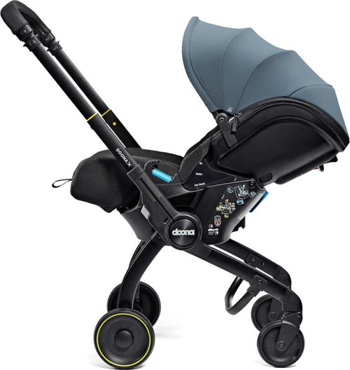 Seggiolino-Auto-e-Passeggino-Doona-X-I-size