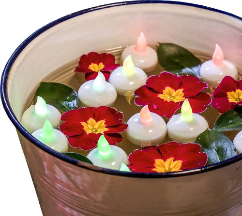 Set 4 candeline multicolor  tea light galleggianti con led RGB e batterie incluse. Casa e cucina/Decorazioni per interni/Candele e portacandele/Candele/Lumini La Zappa - Altamura, Commerciovirtuoso.it