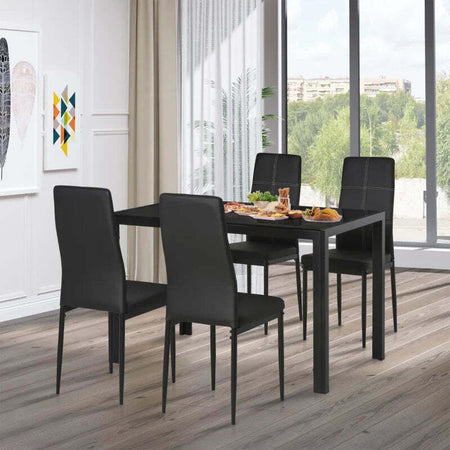 Set-5-Pezzi-con-1-Tavolo-e-4-Sedie-per-Cucina-o-Sala-da-Pranzo-in-Finta-Pelle,-Metallo-e-Vetro-Temperato,-Nero-TR2835-255BKTR2