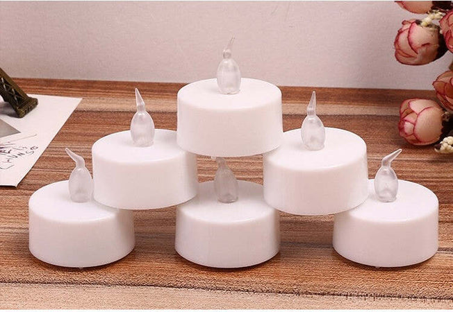 12 CANDELE CANDELINE A BATTERIA TEA LIGHT A LED MULTICOLORE RGB EFFETTO FIAMMA Illuminazione/Illuminazione per interni/Illuminazione speciale/Candele LED Trade Shop italia - Napoli, Commerciovirtuoso.it