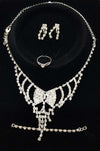 SET COMPLETO PARURE COLLANA FIOCCO ORECCHINI BRACCIALE ANELLO STRASS BIGIOTTERIA Moda/Donna/Gioielli/Collane Trade Shop italia - Napoli, Commerciovirtuoso.it