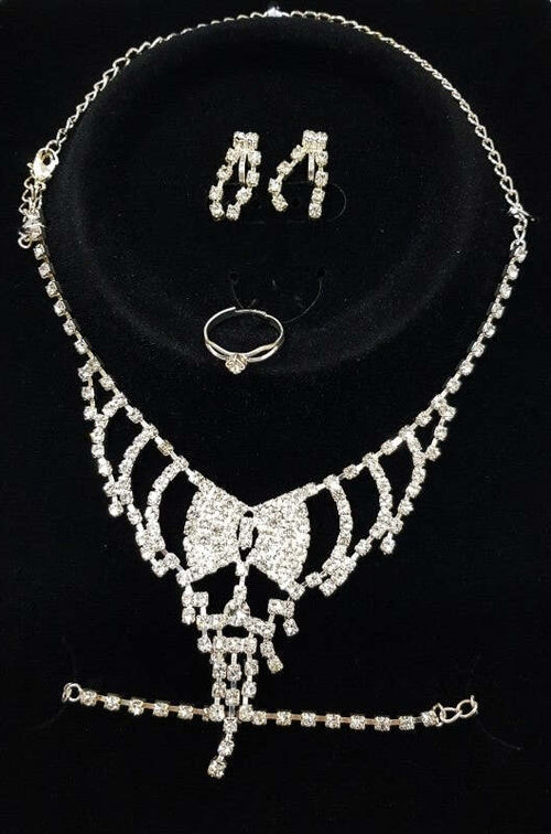 SET COMPLETO PARURE COLLANA FIOCCO ORECCHINI BRACCIALE ANELLO STRASS BIGIOTTERIA Moda/Donna/Gioielli/Collane Trade Shop italia - Napoli, Commerciovirtuoso.it