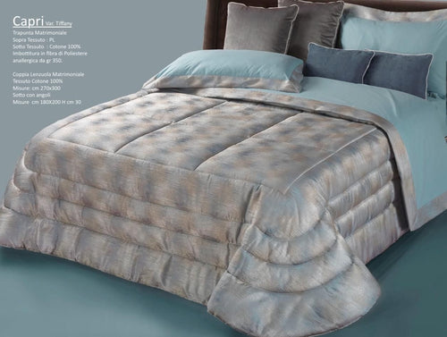 Trapunta matrimoniale art.Capri colore tiffany Mon Amour imbottitura in fibra poliestere anallergica da gr.350 Sopra tessuto: PL sotto tessuto: cotone 100%