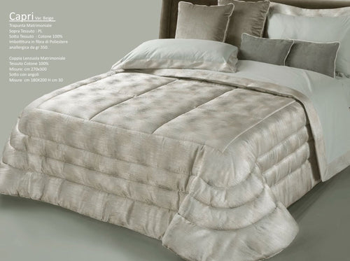 Trapunta matrimoniale art.Capri colore beige Mon Amour imbottitura in fibra poliestere anallergica da gr.350 Sopra tessuto: PL sotto tessuto: cotone 100%