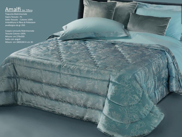 Trapunta matrimoniale art.Amalfi colore tiffany Mon Amour imbottitura in fibra poliestere anallergica da gr.350 Sopra tessuto: PL sotto tessuto: cotone 100%