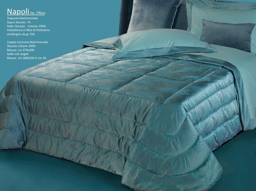 Trapunta matrimoniale art.Napoli colore tiffany Mon Amour imbottitura in fibra poliestere anallergica da gr.350 Sopra tessuto: PL sotto tessuto: cotone 100%