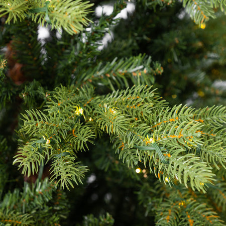 Albero di Natale con microled integrati "St Anton" 70 % in PE Effetto Real Touch