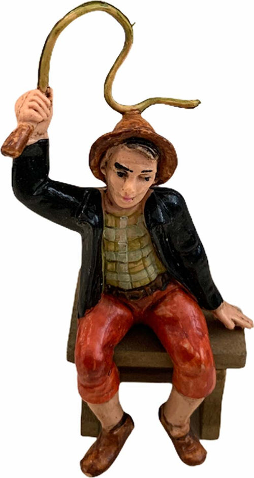 Statuetta per presepe natalizio uomo seduto con una frusta lucida h 7 cm Casa e cucina/Decorazioni per interni/Addobbi e decorazioni per ricorrenze/Decorazioni natalizie/Presepi/Statuine e fondali per il presepe MagiediNatale.it - Altamura, Commerciovirtuoso.it