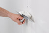 Frattone americano liscio con base in acciaio e portamanico in plastica 12 x 28 cm
