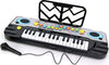 Tastiera Pianola Karaoke Con Microfono Effetti Musicali Melodie E Porta Spartito  Trade Shop italia - Napoli, Commerciovirtuoso.it