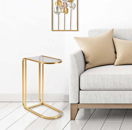 Tavolinetto-struttura-in-metallo-color-oro-ripiano-in-vetro-per-interni
