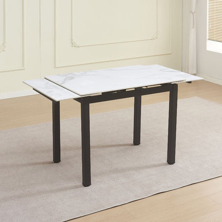 Tavolo allungabile Kyoto con piano in ceramica effetto marmo bianco lucido e struttura in metallo nero