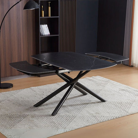 Tavolo girevole automatico allungabile Astrid con piano in ceramica effetto marmo nero opaco con gambe colore nero