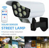 Telecamera-Finta-Pannello-Solare-Con-Sensore-Di-Movimento-77-Led-Faretto-Luce