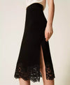 Twinset gonna longuette donna in maglia nera con pizzo ricamato e spacco laterale dettaglio
