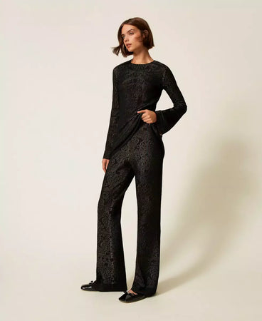 Twinset Pantaloni dpnna flare in maglia traforata