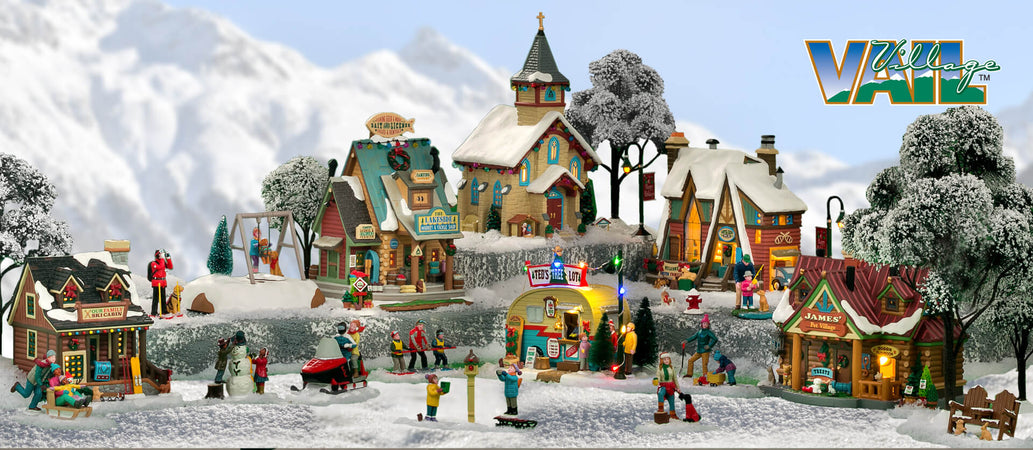 Resort invernale in poliresina natalizio con sciatori animati per villaggio di Natale