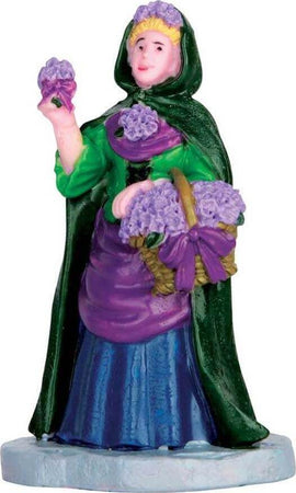 Venditrice di Viole, personaggio per villaggio di Natale in poliresina Casa e cucina/Decorazioni per interni/Addobbi e decorazioni per ricorrenze/Decorazioni natalizie/Oggettistica MagiediNatale.it - Altamura, Commerciovirtuoso.it