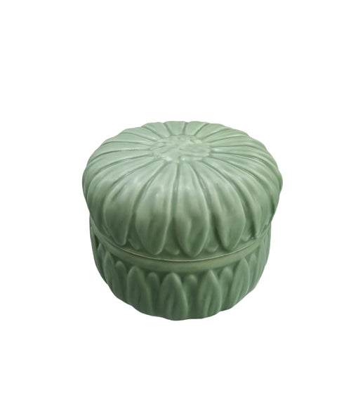 Candela in porcellana Schonherr Sunflower da 150gr, disponibile in sei colori colormat, decorativa con scatola regalo inclusa.