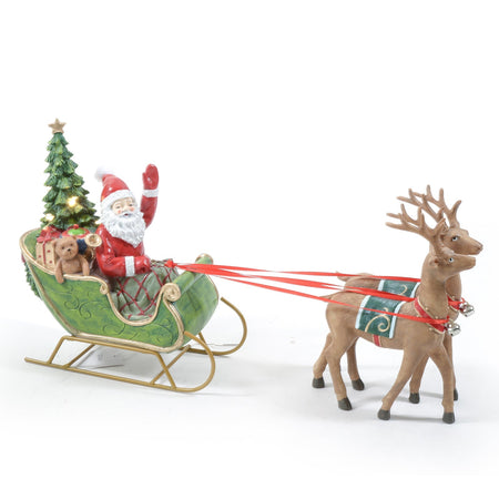 Statuetta decorativa "Babbo Natale con slitta e renne" con albero e luci h 26 cm Casa e cucina/Decorazioni per interni/Addobbi e decorazioni per ricorrenze/Decorazioni natalizie/Schiaccianoci MagiediNatale.it - Altamura, Commerciovirtuoso.it
