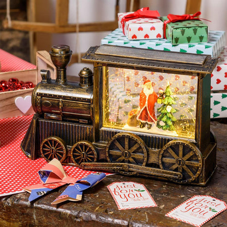 Lanterna natalizia "Treno" effetto nevicata decorazione a led con batteria Casa e cucina/Decorazioni per interni/Addobbi e decorazioni per ricorrenze/Decorazioni natalizie/Neve artificiale MagiediNatale.it - Altamura, Commerciovirtuoso.it