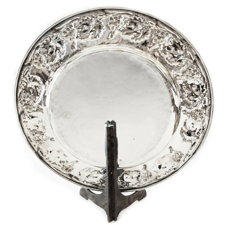 Piatto ornamentale in argento 800, con bordo cesellato lavorato a mano